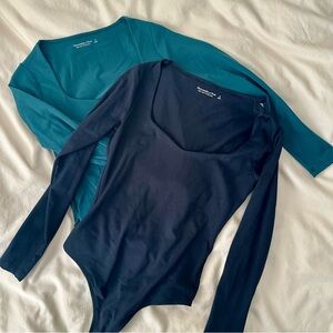 Abercrombie & Fitch | Long Sleeve Bodysuits in Black and Teal | Set of 2!